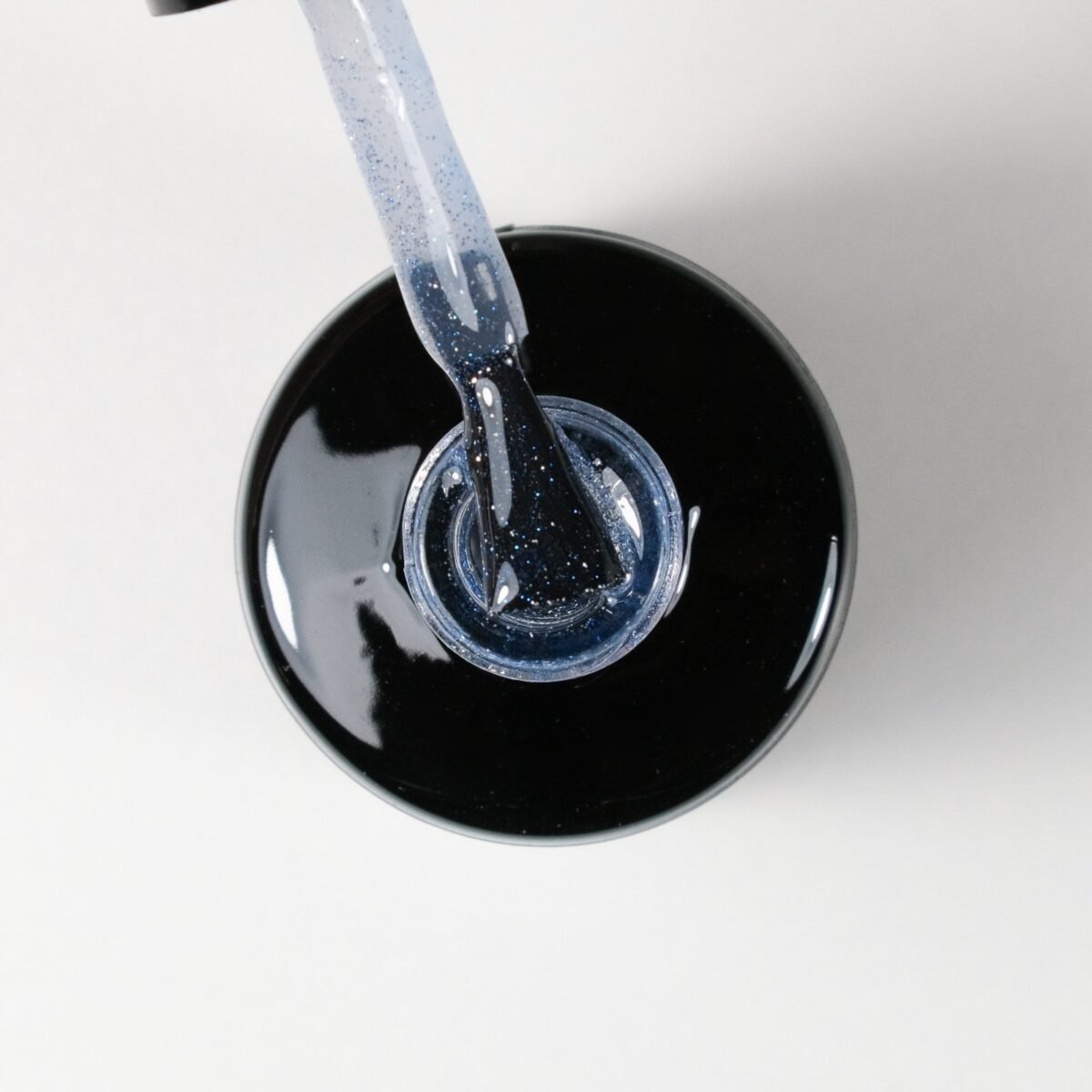 Gaismu atstarojoša gēla lakas virskārta (top coat), bez lipīguma "Flash" top blue, 12ml - Image 2