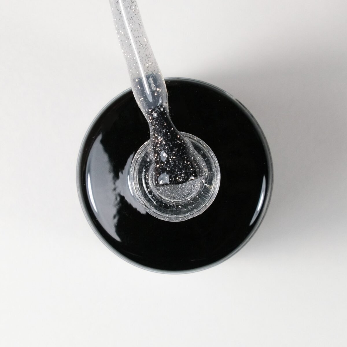 Gaismu atstarojoša gēla lakas virskārta (top coat), bez lipīguma "Flash" top black, 12ml - Image 2